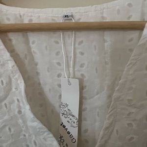 White eyelet dress, new with tags. Never worn cute summer dress